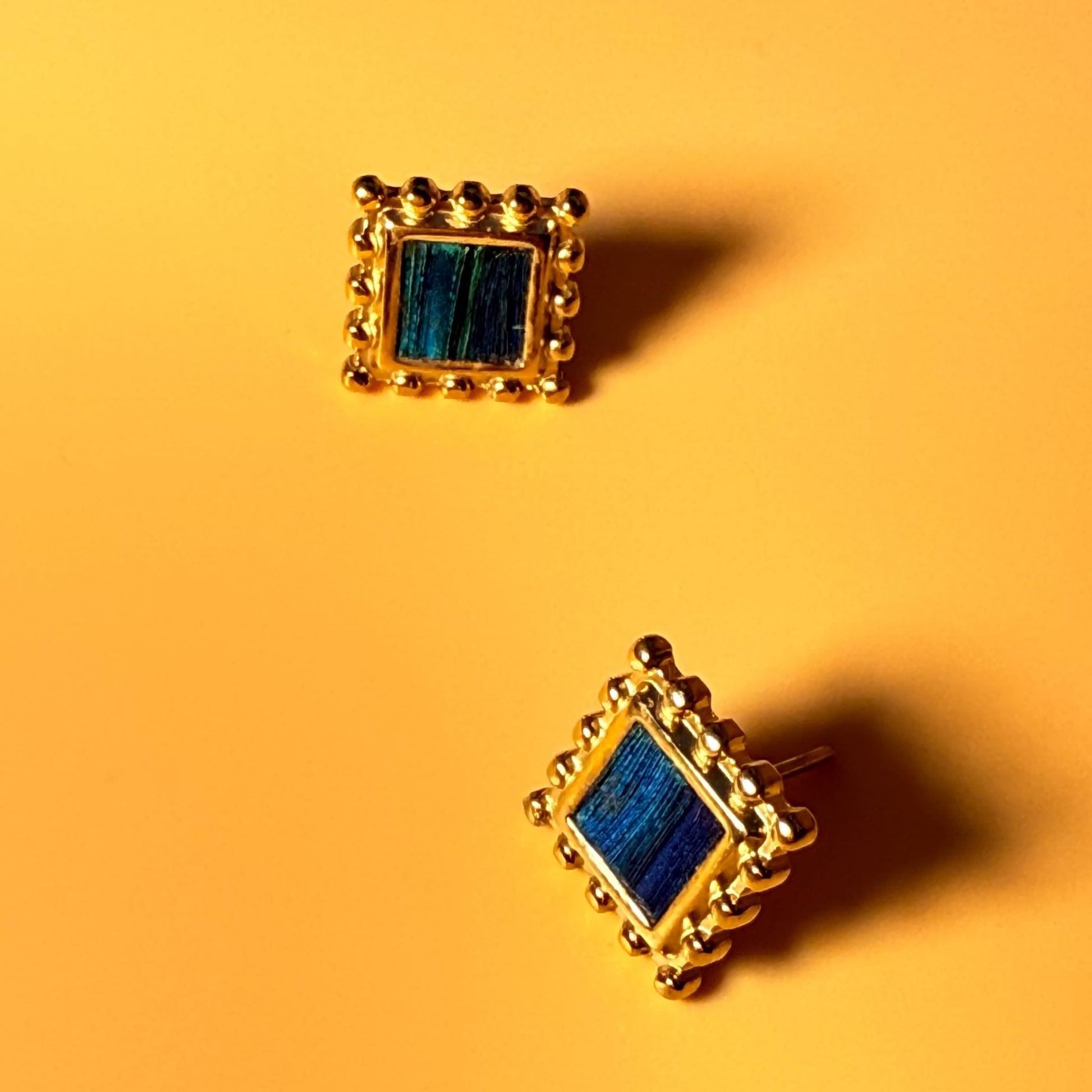 The beauty of Iris Iridescent Feather Stud Earrings by Cici Dream